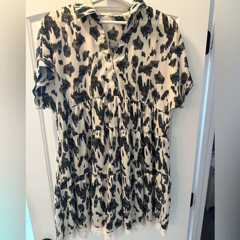 Black and cream animal print Umgee mini dress.